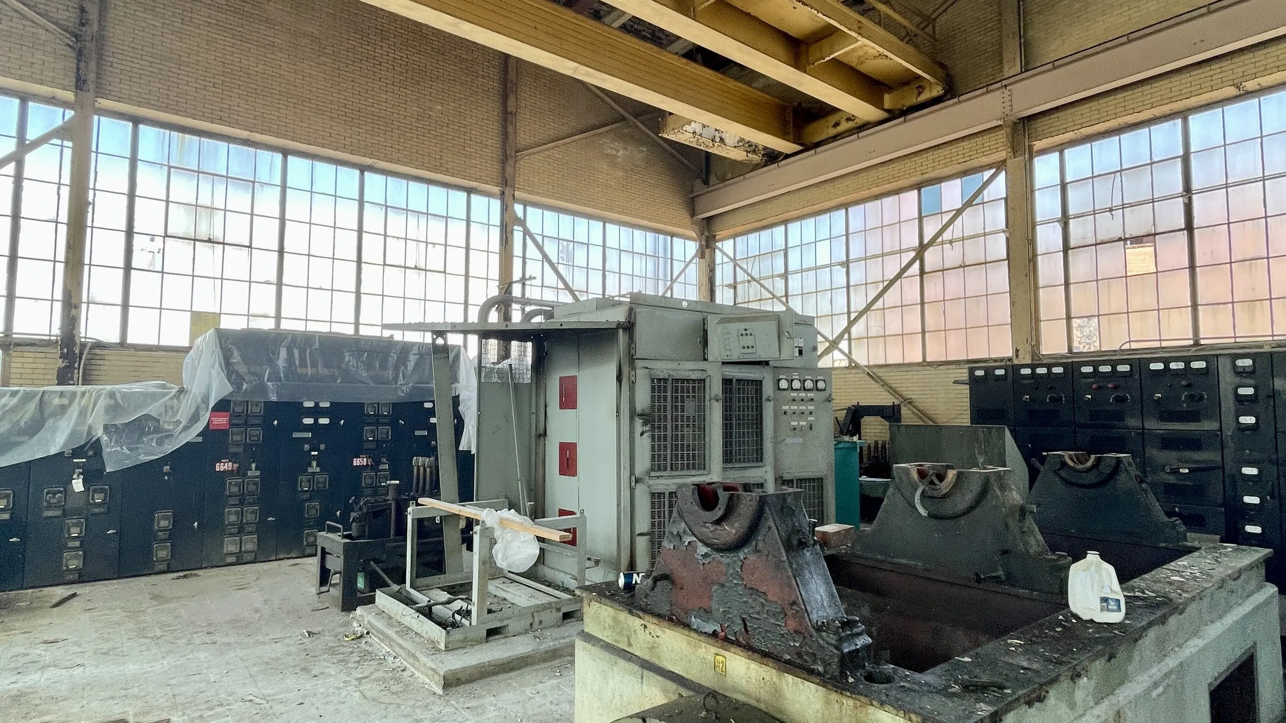 Industrial switchgear and motor control centers inside a facility electrical room